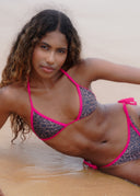 The perfect bikini for flawless tanlines. Featuring a bold leopard print and a minimal unpadded fit for a natural look.