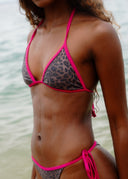 The perfect bikini for flawless tanlines. Featuring a bold leopard print and a minimal unpadded fit for a natural look.