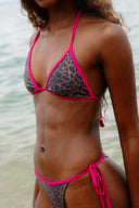 The perfect bikini for flawless tanlines. Featuring a bold leopard print and a minimal unpadded fit for a natural look.