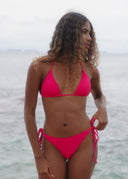 Honëlo’s timeless triangle bikini top. Comfortable, adjustable, and designed for endless beach days.