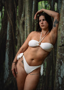 Beach Date bikini by Honëlo. A playful bandeau top with a signature center ring. Perfect for your sunny getaways.