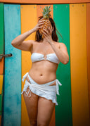 Beach Date bikini by Honëlo. A playful bandeau top with a signature center ring. Perfect for your sunny getaways.