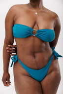 Honëlo Beach Date bandeau top in Ocean Teal, studio shot